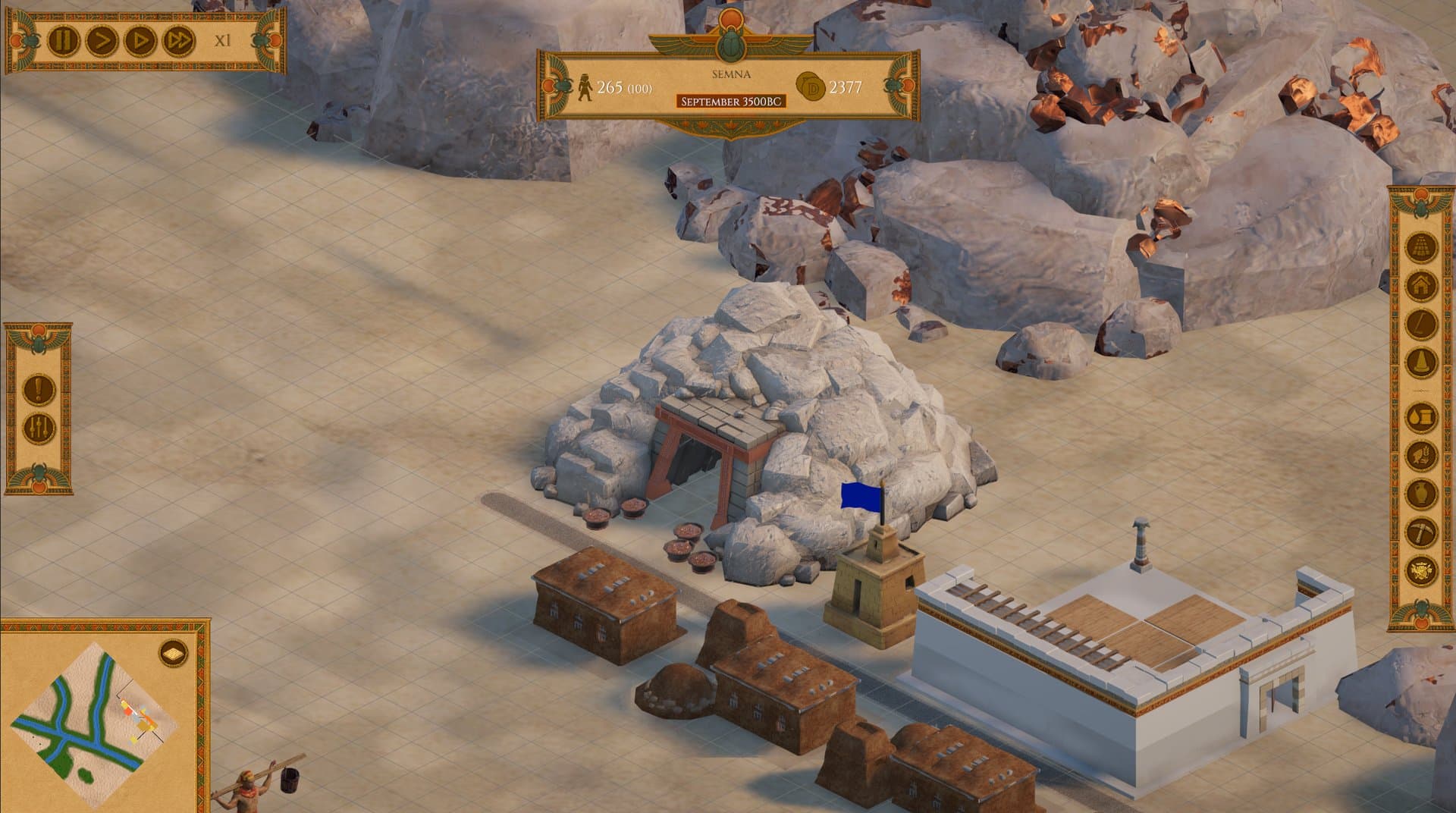 A bronze foundry and storehouses beside a rocky outcrop